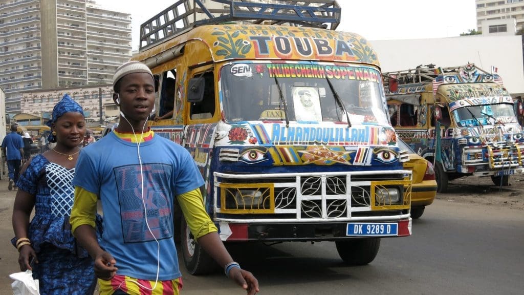 For 50 years, the fast and cheap "car rapide" minibus, painted from stem to stern, has become a national symbol for Senegal.