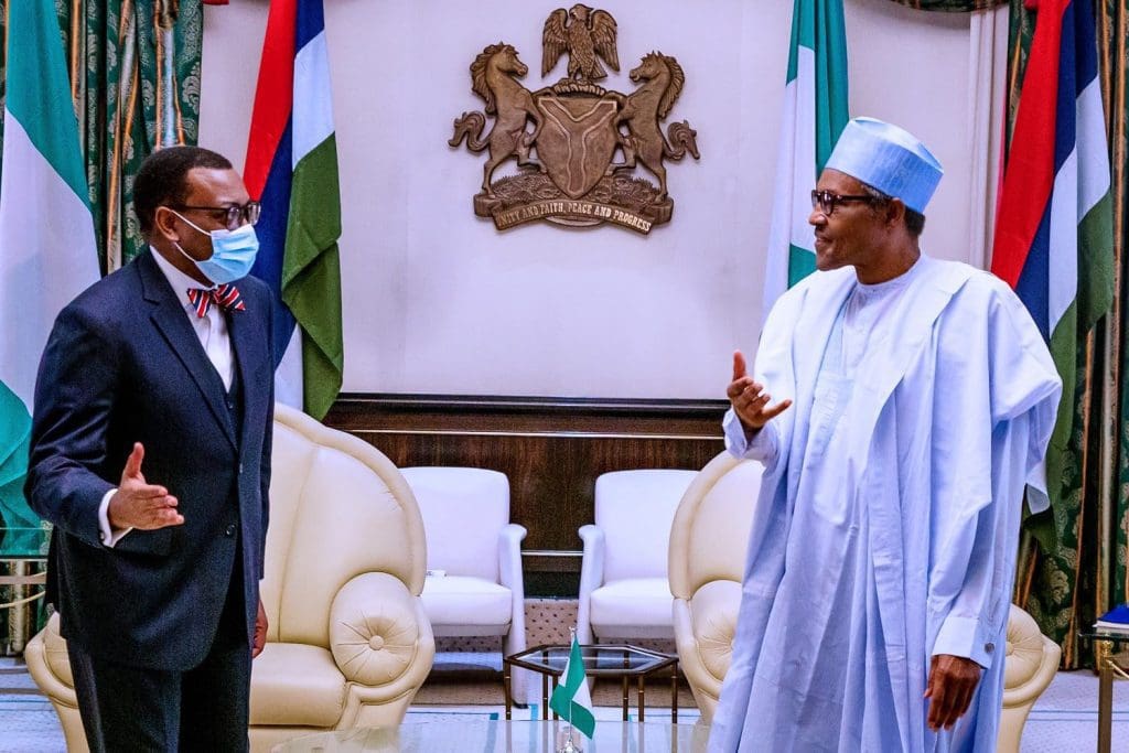 Akinwumi Adenisa et Muhammadu Buhari